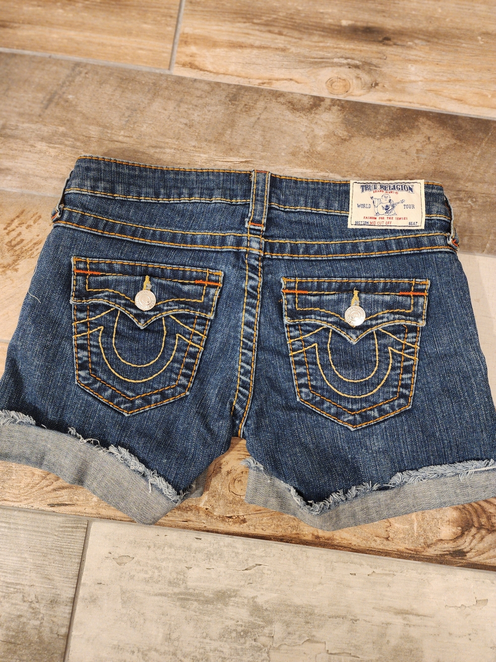 True Religion Mid Wash Rolled Cuff Distressed Denim Shorts - Picture 3 of 6